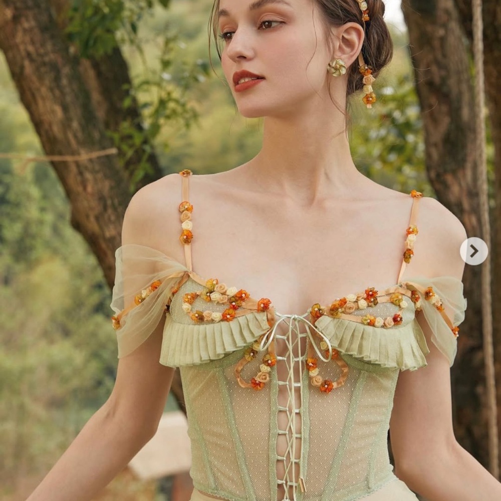 Elegant Green Corset Dress with Floral Accents